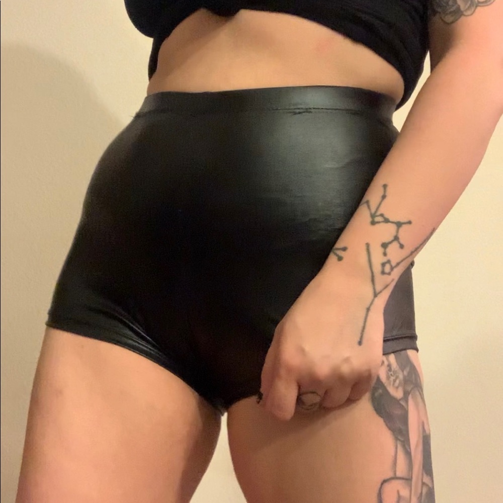 Black metallic wet look short shorts